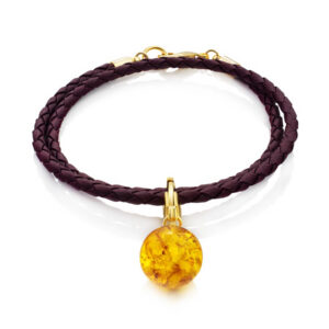 An original transformable bracelet with a pendant made of natural sparkling amber