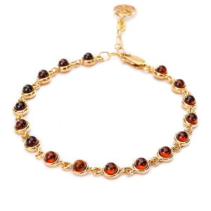 Gold plated bracelet with cherry color Polish amber
