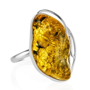 Evening ring made of yellow-green amber "Rialto"