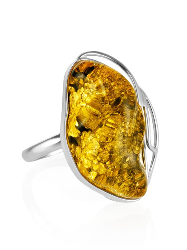 Evening ring made of yellow-green amber "Rialto"