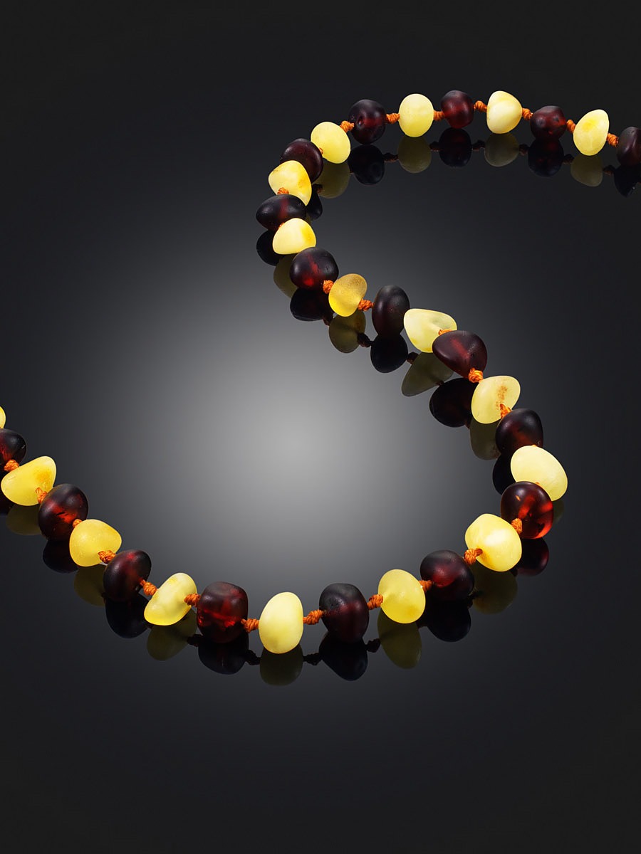 Children's beads with soft polishing from natural amber "Pebble two-color matte" - Image 3