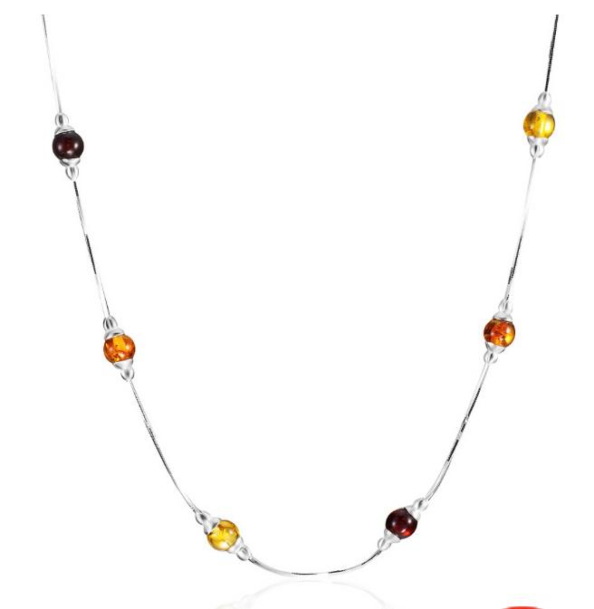 A positive necklace made of natural amber in different shades, "Caramel"
