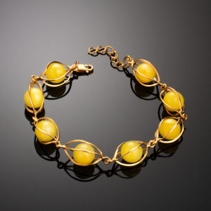 Beautiful gilded bracelet with natural honey-colored amber Algeria - Image 2
