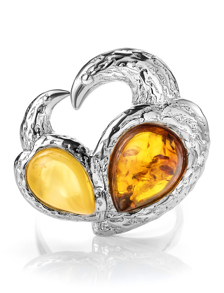 Bright ring with an insert made of natural amber in honey and cognac colors Lyrica 17.5