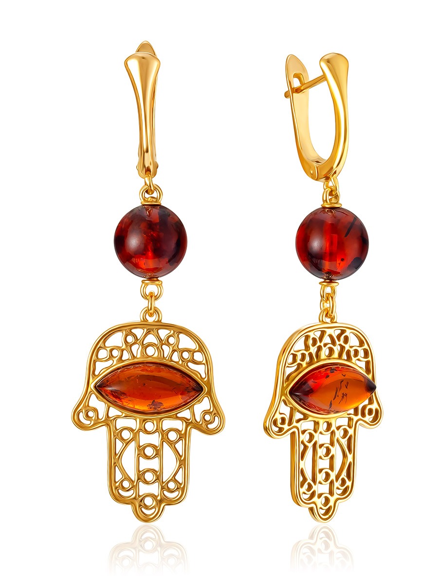 Bright, openwork, gilded earrings with cherry amber "Hamsa"