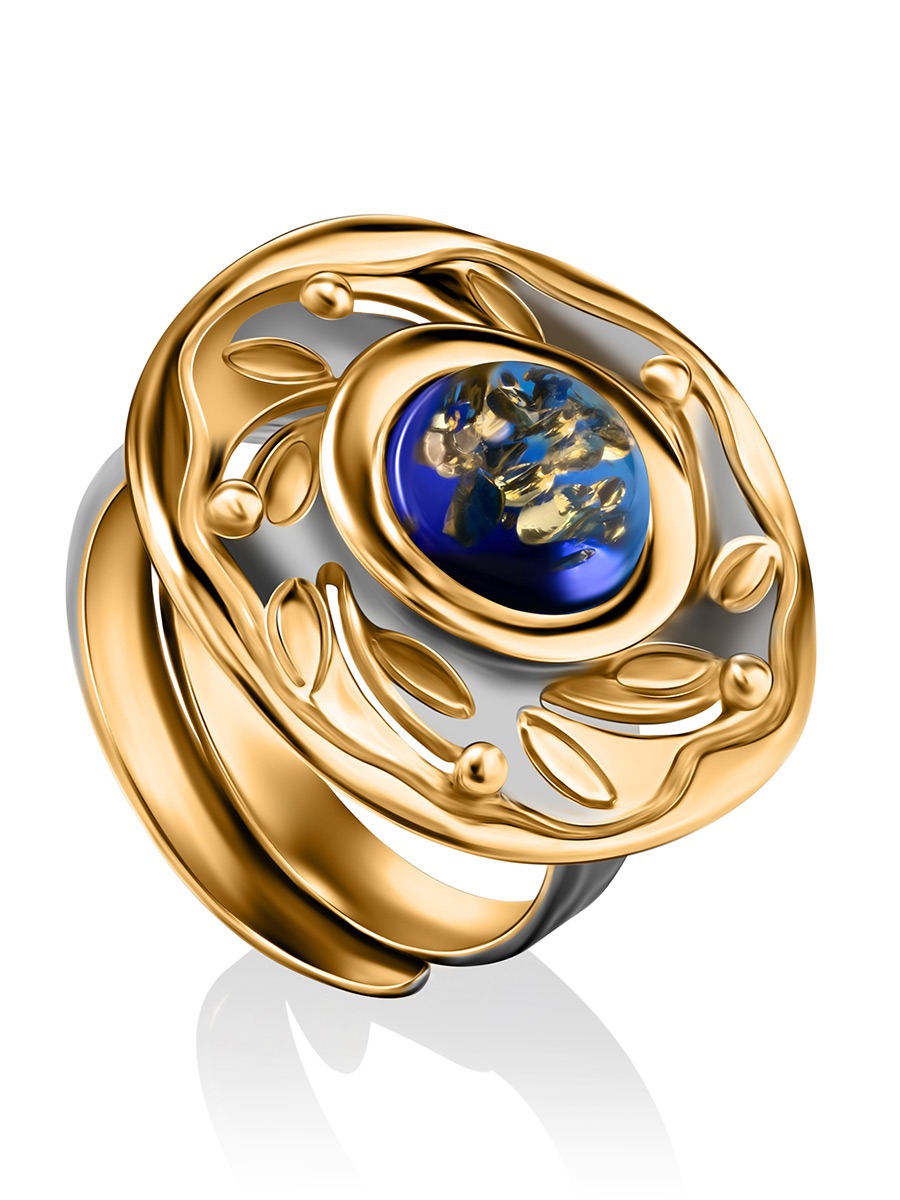Amazing vintage design ring decorated with blue Aida amber