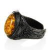 Leather-ring-with-large-sparkling-greenish-amber-1.jpeg Leather & Amber Statement Ring