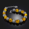 Openwork-bracelet-Aphrodite-with-molded-lemon-amber-1.jpeg Baltic Sun Natural Amber Bracelet